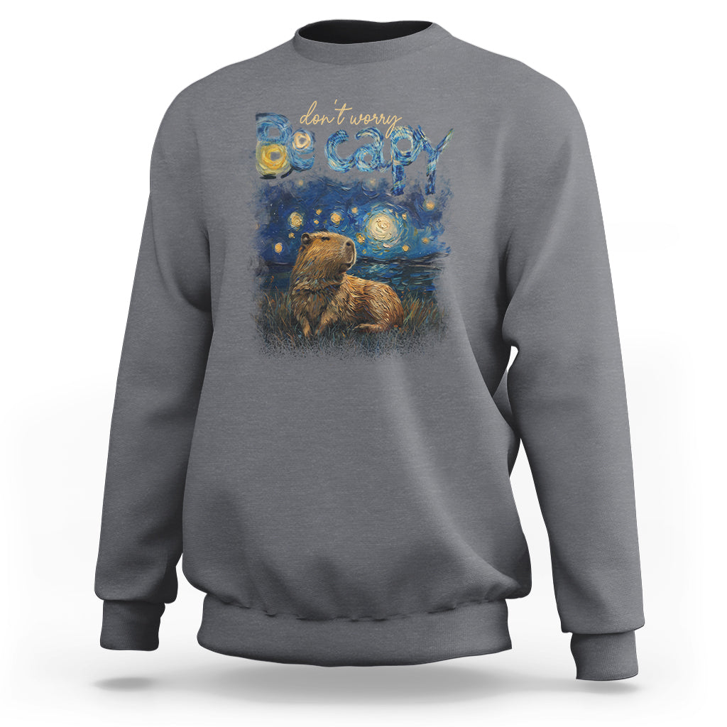 Charcoal gray crewneck sweatshirt with colorful capybara night graphic on the front