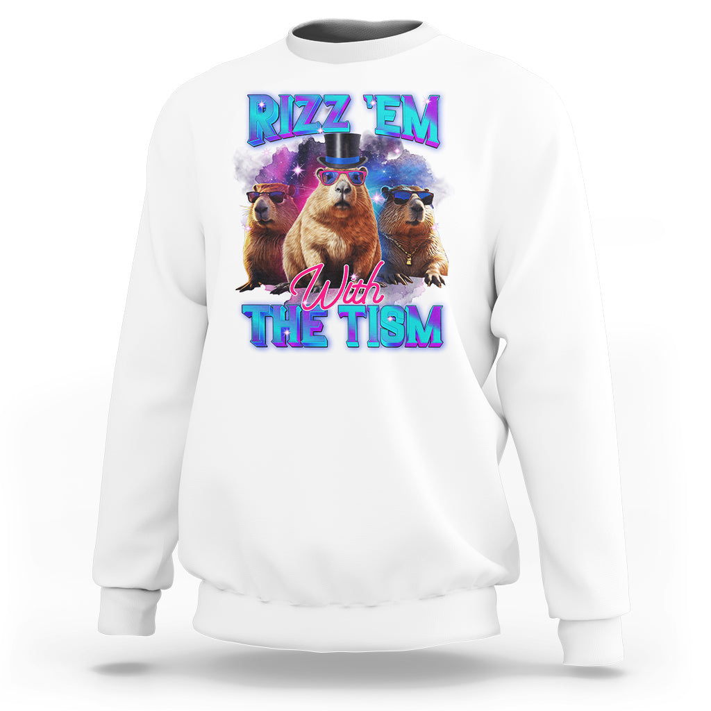 White sweatshirt with capybara graphic: "RIZZ 'EM" "With THE TISM"