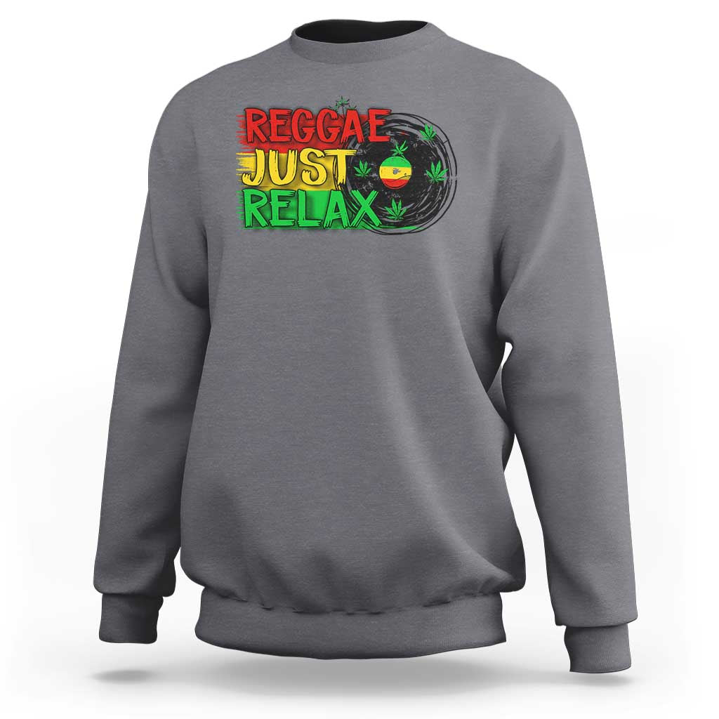 Charcoal gray crewneck sweatshirt with colorful 'Reggae Just Relax' graphic and leaf print