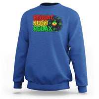 Royal blue crewneck sweatshirt with colorful 'Reggae Just Relax' graphic and leaf print