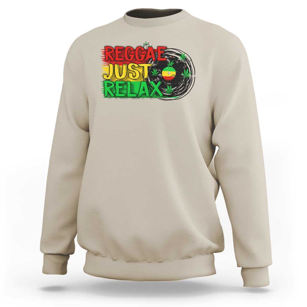 Sand crewneck sweatshirt with colorful 'Reggae Just Relax' graphic and leaf print