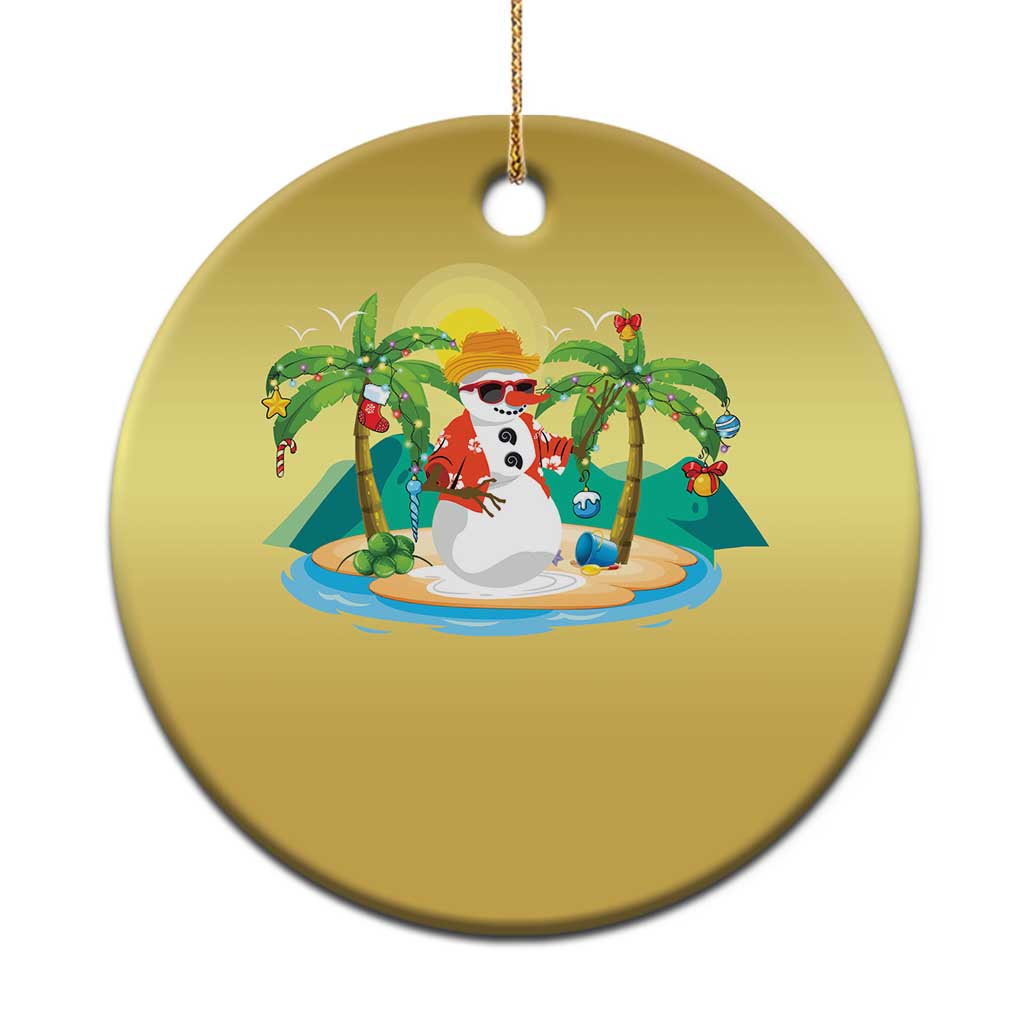 Gold round Christmas ornament with a cartoon snowman on a tropical beach