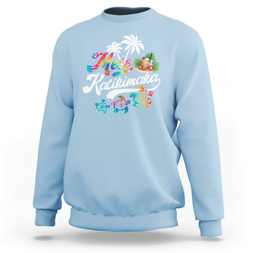 Light blue Christmas sweatshirt with Mele Kalikimaka graphic of turtles and palms