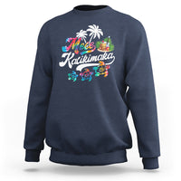 Navy Christmas sweatshirt with Mele Kalikimaka graphic of turtles and palms