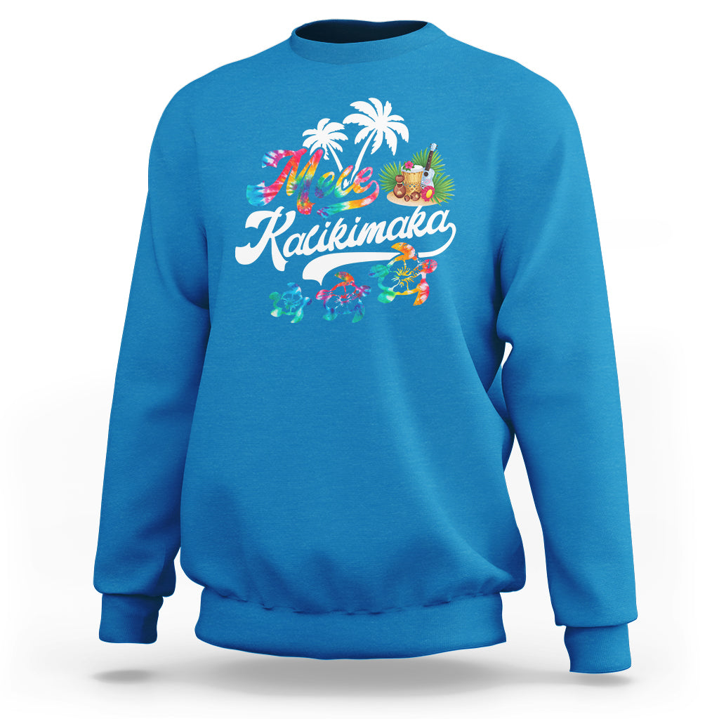Bright blue Christmas sweatshirt with Mele Kalikimaka graphic of turtles and palms