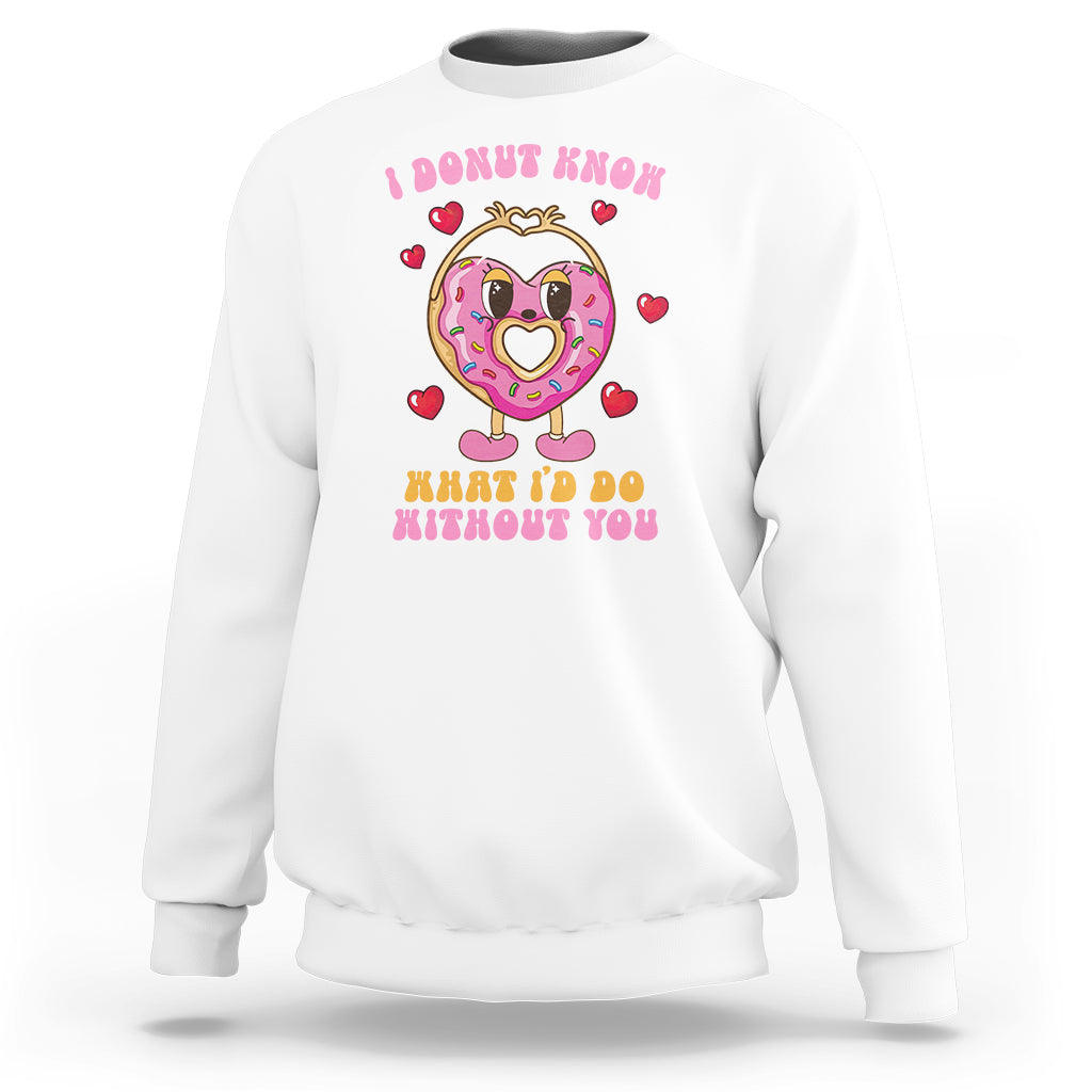 White Valentine’s Day sweatshirt with pink donut character and heart-themed text
