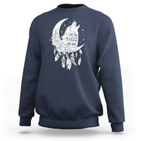 Navy crewneck sweatshirt with white moon-and-wolf graphic and feathered dreamcatcher print