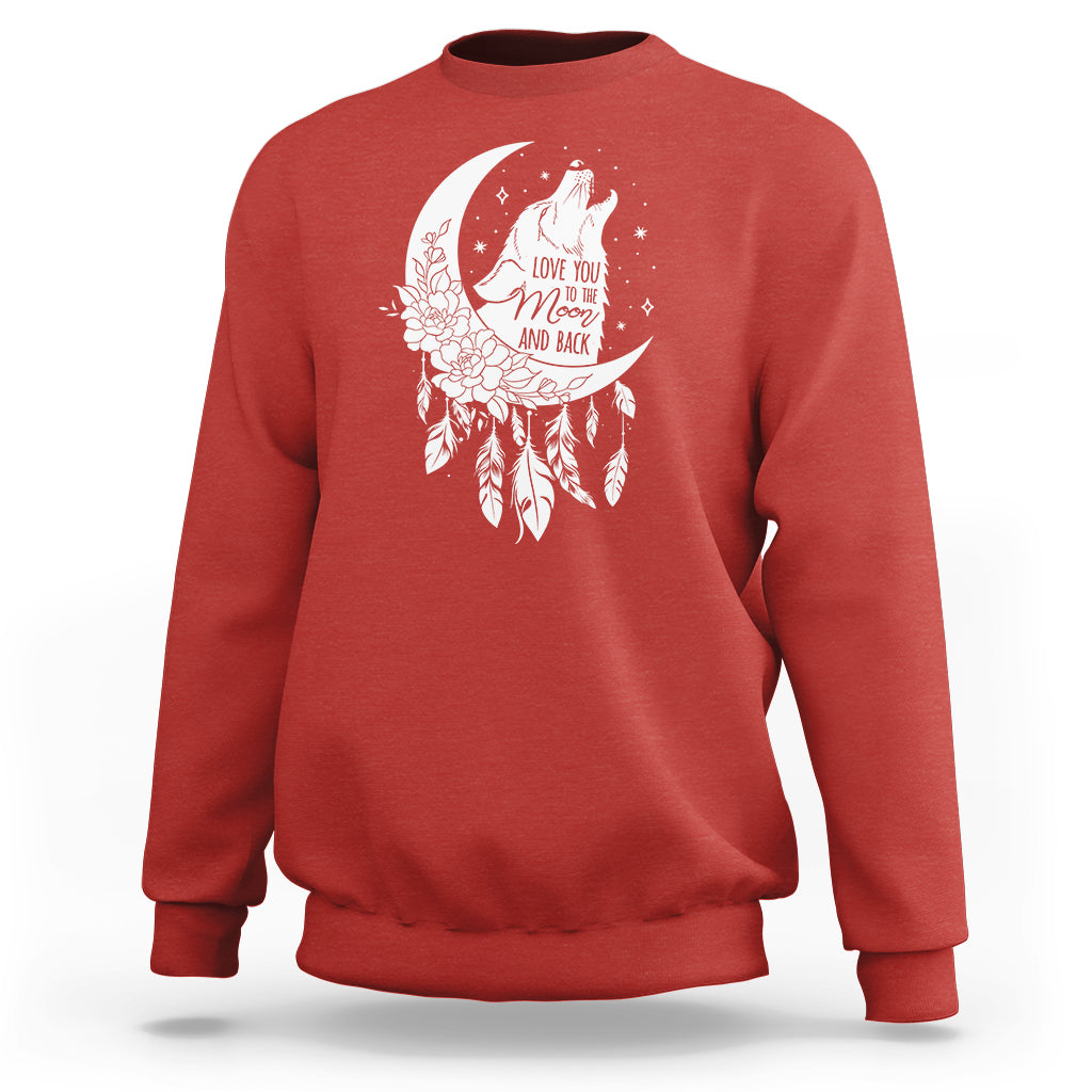 Red crewneck sweatshirt with white moon-and-wolf graphic on the chest
