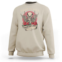 Beige crewneck sweatshirt with skeleton rock-and-love graphic on chest