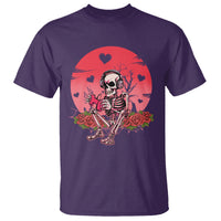 Purple skeleton gamer graphic T-shirt with red heart burst and floral accents