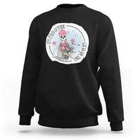 Black crewneck sweatshirt with circular skeleton and rose floral graphic on chest.