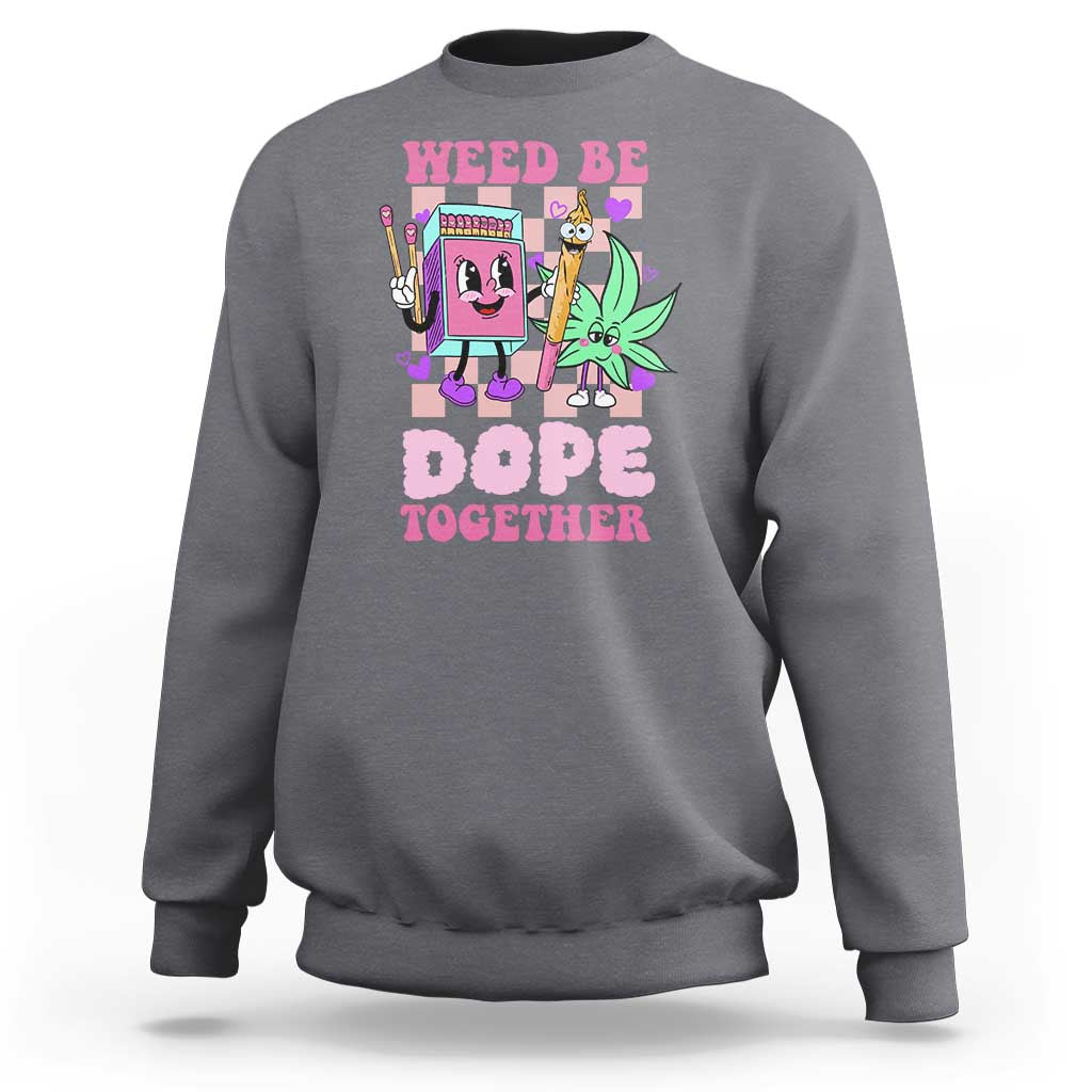 Charcoal gray crewneck sweatshirt with colorful front graphic reading “Weed Be Dope Together”.
