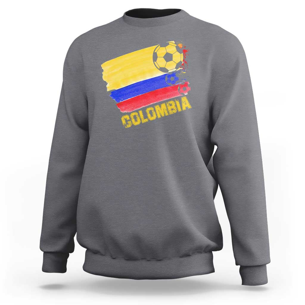 Charcoal gray crewneck sweatshirt with Colombia soccer flag graphic on the back