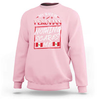Light pink crewneck sweatshirt with Peruvian flag graphic and bold slogan on chest.