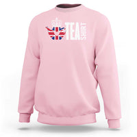 Light pink crewneck sweatshirt with Union Jack tea graphic and bold "TEA" print on chest