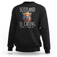 Black crewneck sweatshirt with Highland cow graphic and Scotland quote front print