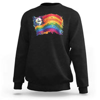 Black crewneck sweatshirt with rainbow flag graphic and small 'la' print at chest