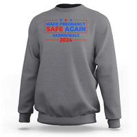 Gray crewneck sweatshirt with front graphic text and stars, “MAKE PREGNANCY SAFE AGAIN 2024”