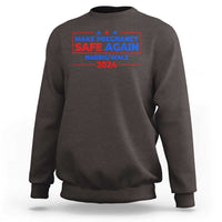 Charcoal crewneck sweatshirt with front graphic text and stars, “MAKE PREGNANCY SAFE AGAIN 2024”