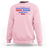 Light pink crewneck sweatshirt with front graphic text and stars, “MAKE PREGNANCY SAFE AGAIN 2024”
