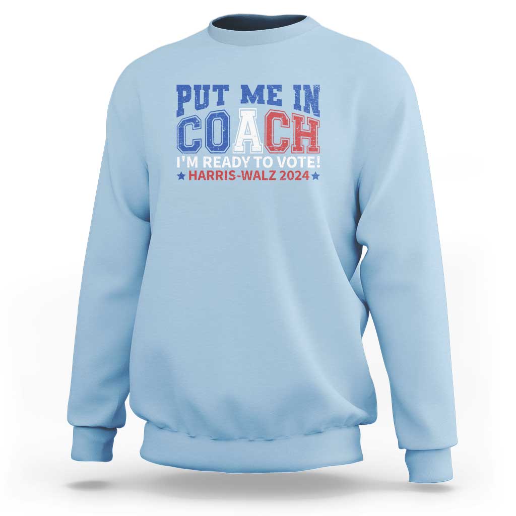 Light blue crewneck sweatshirt with blue “Put Me In Coach” election graphic on front