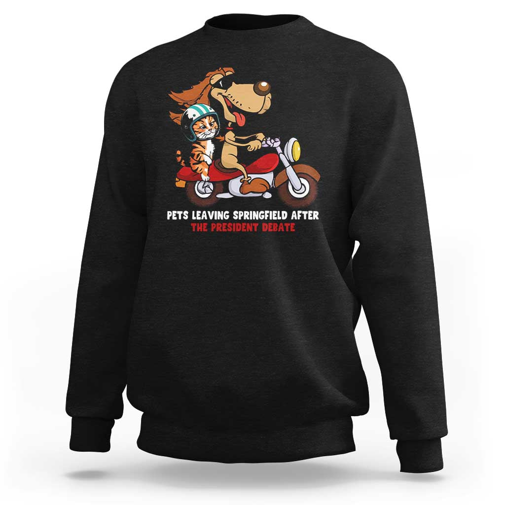 Black sweatshirt with cartoon pets graphic and red slogan text on the chest