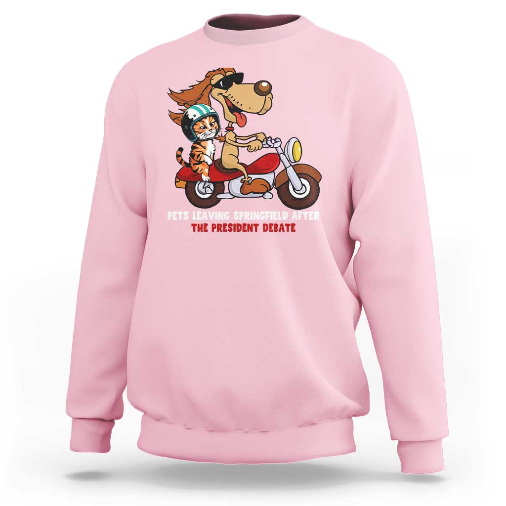 Light pink sweatshirt with cartoon pets graphic and red slogan text on the chest