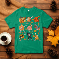 Green Thanksgiving graphic T-shirt with dancing turkey, dinosaur, and pumpkin pie characters