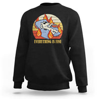 Black sweatshirt with front circular dog-with-flames graphic and “EVERYTHING IS FINE” text.