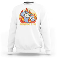 White sweatshirt with front circular dog-with-flames graphic and “EVERYTHING IS FINE” text.