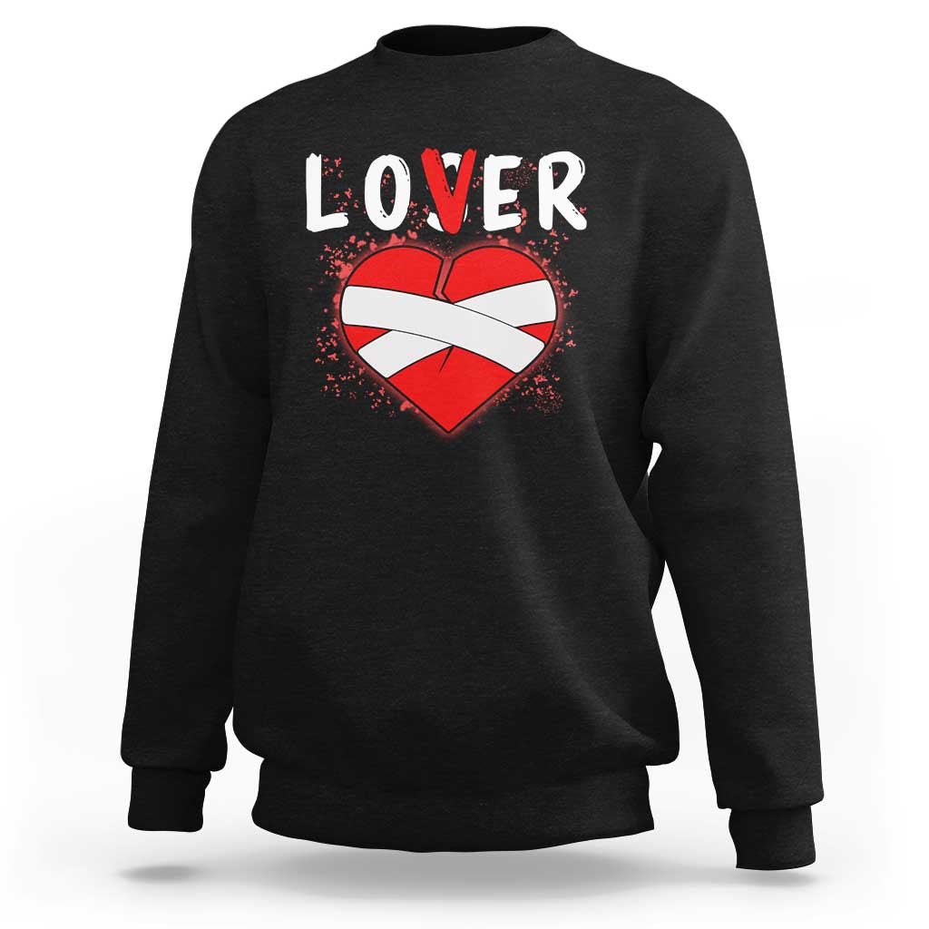 Black crewneck sweatshirt with 'LOVER' heart graphic, long sleeves.