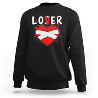 Black crewneck sweatshirt with 'LOVER' heart graphic, long sleeves.