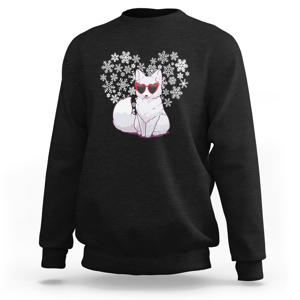 Black crewneck sweatshirt with arctic snow fox wearing red heart glasses and snowflakes