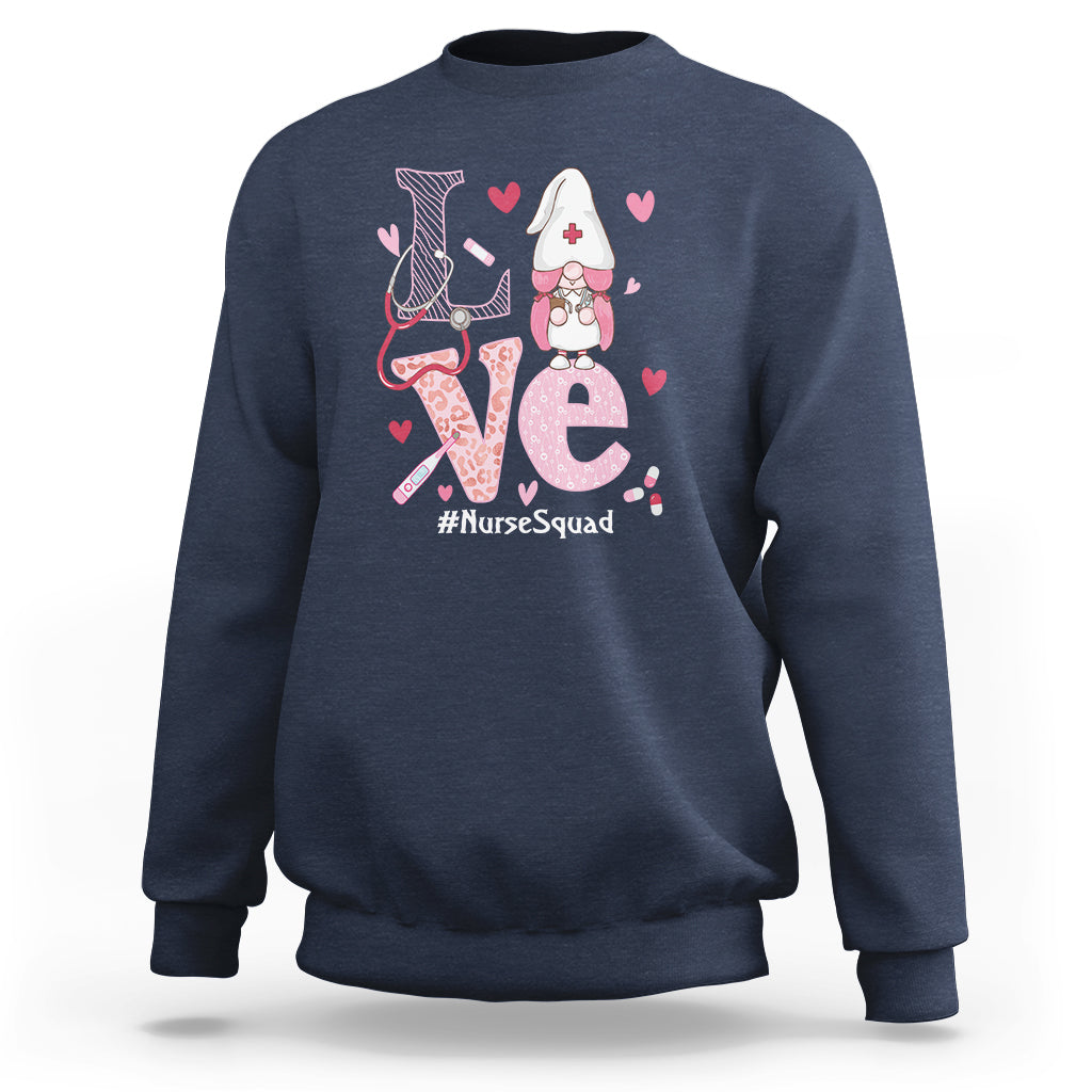 Navy sweatshirt with nurse gnome graphic, hearts, and #NurseSquad text