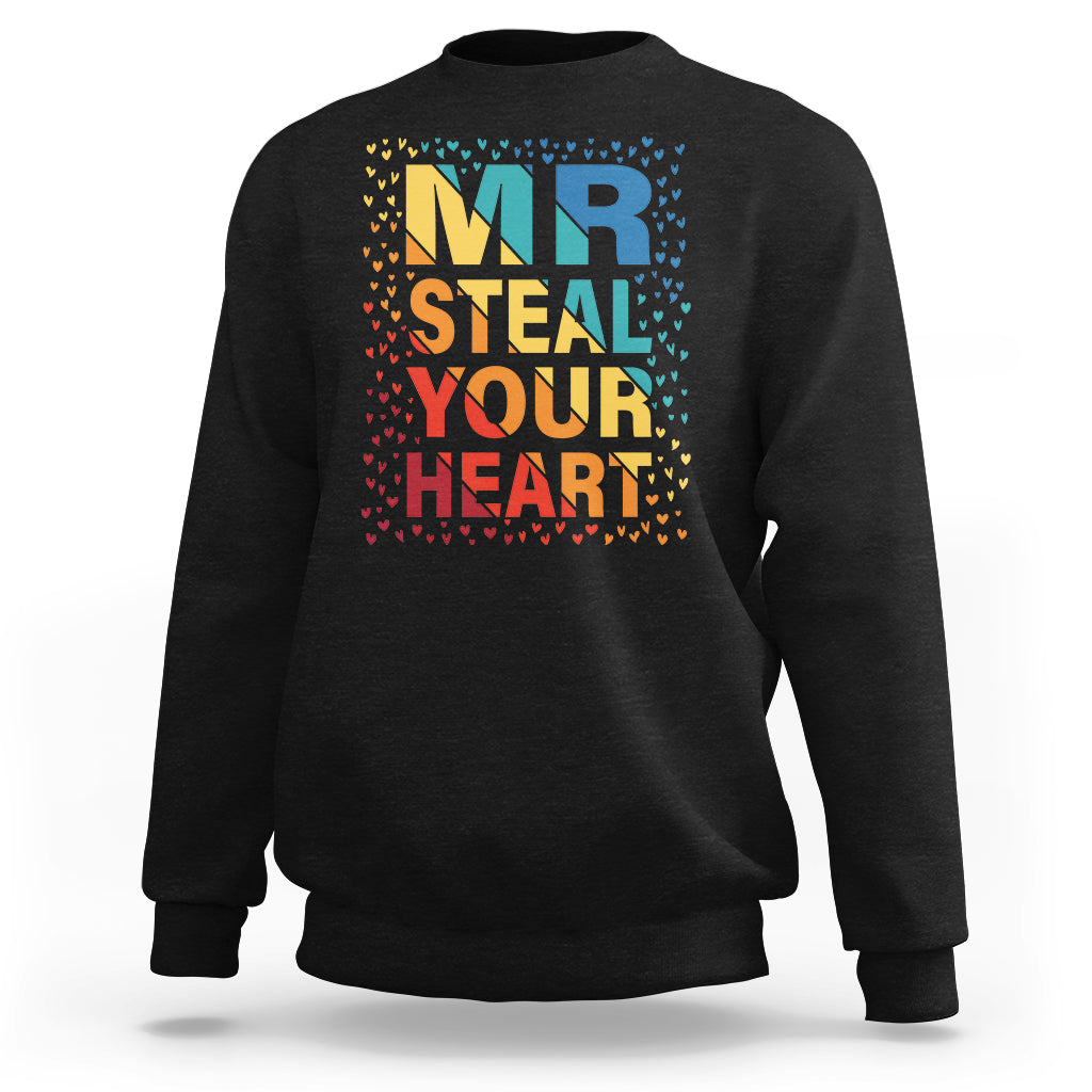 Black unisex sweatshirt with “MR STEAL YOUR HEART” rainbow heart graphic