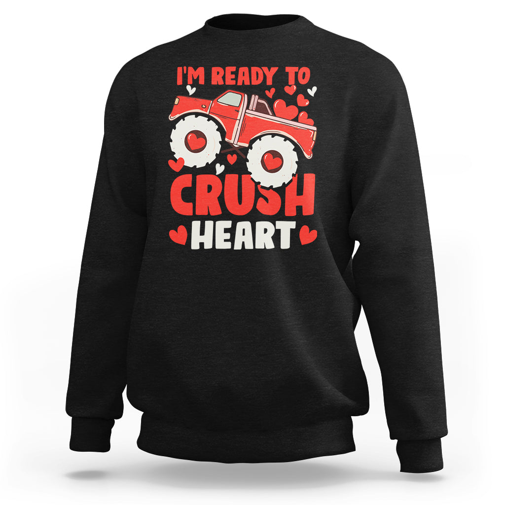 Black sweatshirt with monster truck and hearts graphic, text "CRUSH HEART"