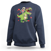 Navy sweatshirt with front graphic of skeleton riding a green dinosaur with red hearts