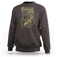 Dark brown crewneck sweatshirt with gold hunting-and-fishing retirement graphic on back
