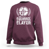 Maroon crewneck sweatshirt with vintage squirrel slayer emblem graphic on front