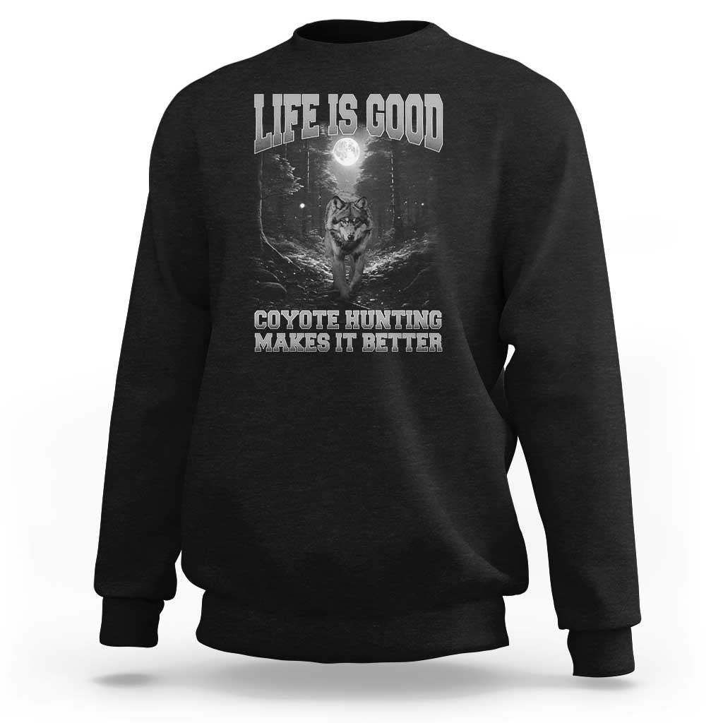 Black crewneck sweatshirt with coyote graphic and text "Life is Good" and "Coyote Hunting Makes It Better"