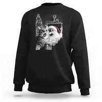 Black sweatshirt with cat-and-Santa graphic print on the back