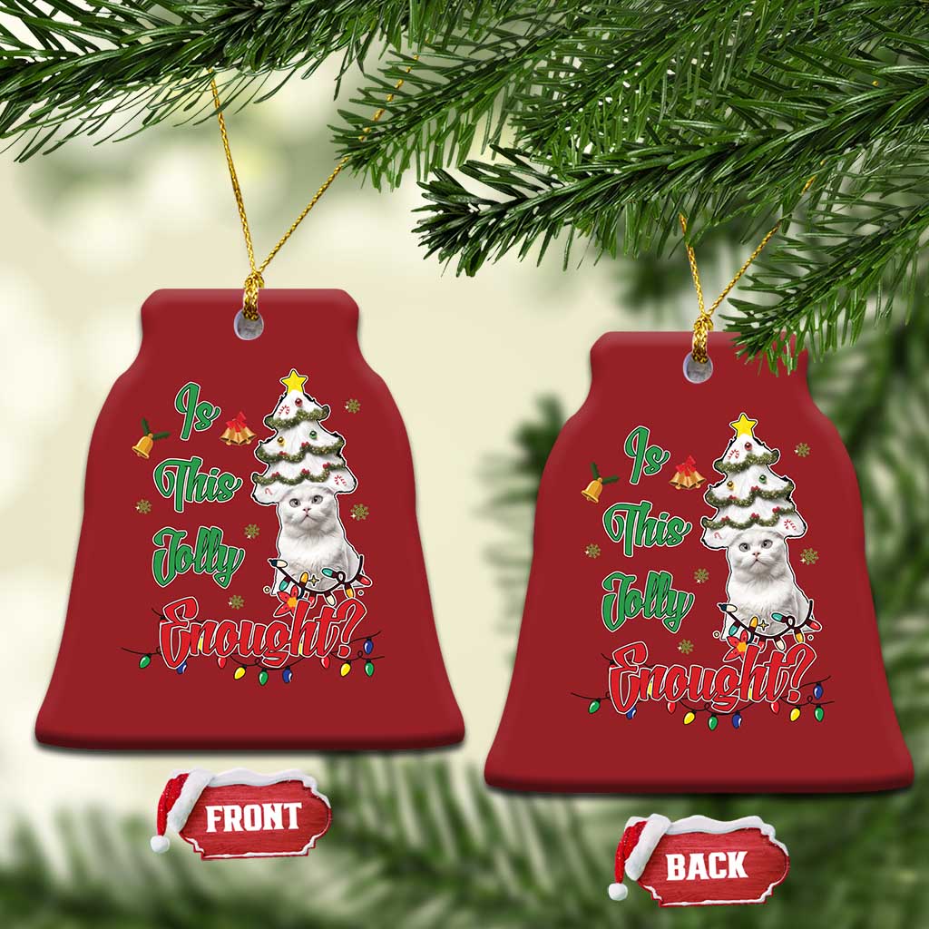 Two red bell-shaped cat Christmas ornaments, shown with front and back labels.
