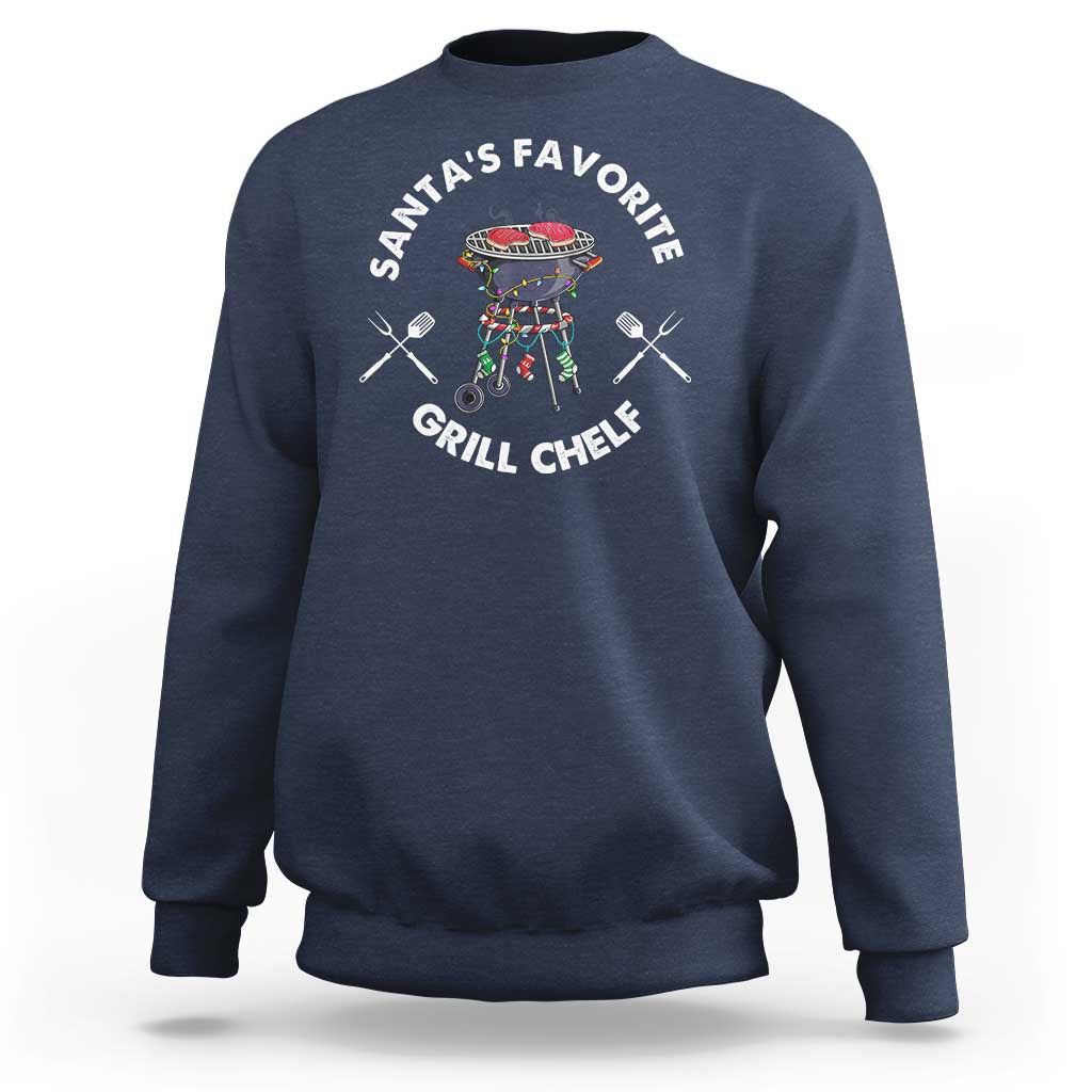 Navy crewneck sweatshirt with BBQ chef graphic and “Santa’s Favorite Grill Chef” text.