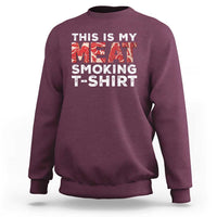 Maroon sweatshirt with front text graphic "THIS IS MY MEAT SMOKING T-SHIRT".