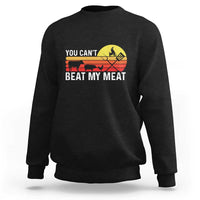 Black crewneck sweatshirt with 'YOU CAN'T BEAT MY MEAT' grill graphic