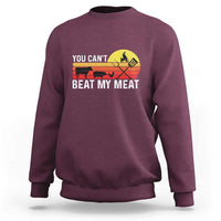 Maroon crewneck sweatshirt with 'YOU CAN'T BEAT MY MEAT' grill graphic