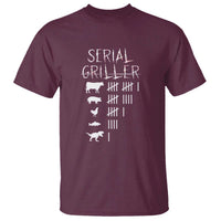 Maroon T-shirt with white "Serial Griller" graphic and pig lineup on front