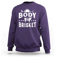 Purple crewneck BBQ sweatshirt with large “BODY BY BRISKET” graphic on chest