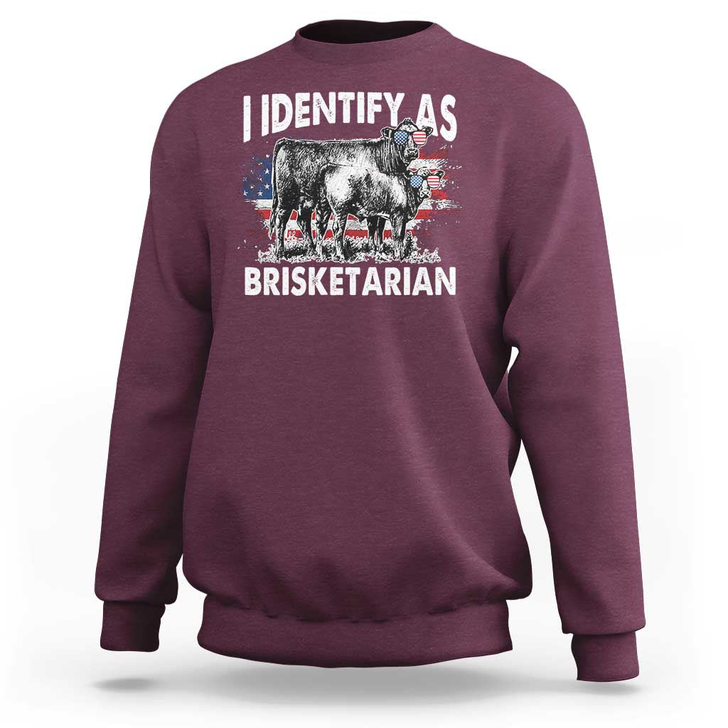 Maroon sweatshirt with 'IDENTIFY AS BRISKETARIAN' bull graphic and flag collage
