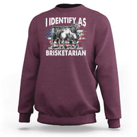 Maroon sweatshirt with 'IDENTIFY AS BRISKETARIAN' bull graphic and flag collage